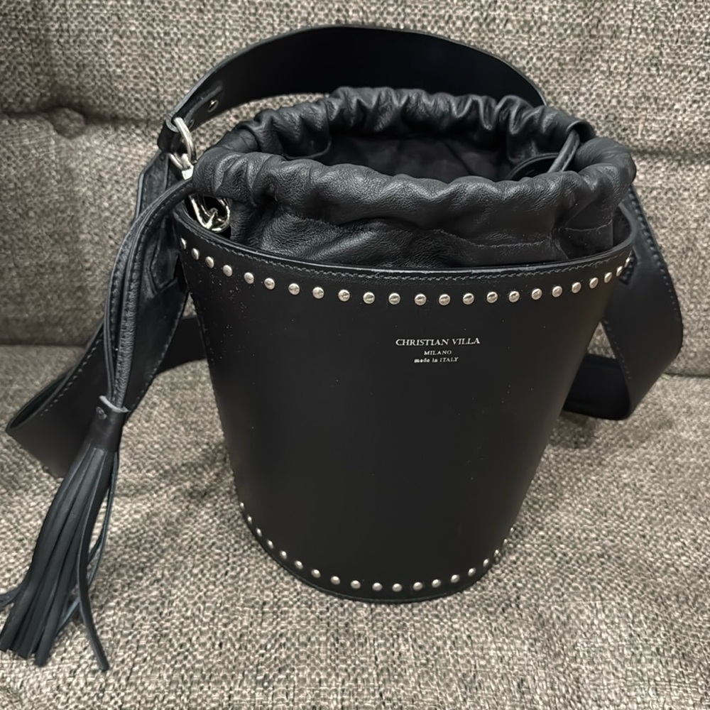 NWT . Christian Viilla Drawstring black leather Bucket Bag.